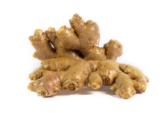 Fresh ginger root (Zingiber officinale) isolated on a white background. This rhizome is popular as a cooking spice and a traditional herbal remedy.