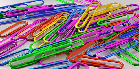 Colorful paperclips scattered randomly on a white background, showcasing a variety of bright hues and overlapping arrangements.