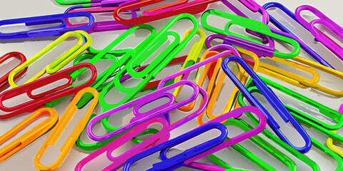 Colorful paperclips scattered randomly on a white background, showcasing a variety of bright hues and overlapping arrangements.