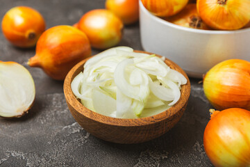 Onion on the kitchen table. onion slice. onion rings. Fresh Yellow Onion. Natural, fresh, vegetarian food. Agricultural products. Healthy eating. Vegetables. Farmer's market. Space for text.Copy space