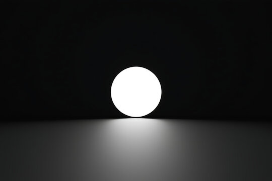 A single luminous orb glows brightly in the center of a dark room casting a soft radiant light on a polished surface below