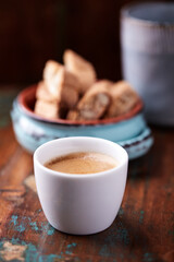 Cup of coffee on rustic wooden background. Soft focus. Copy space	
