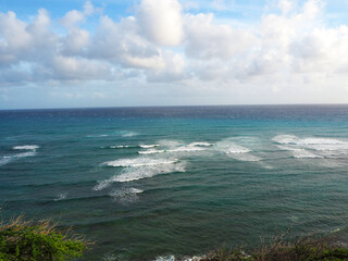 The magnificent ocean of Hawaii with an emerald green gradient