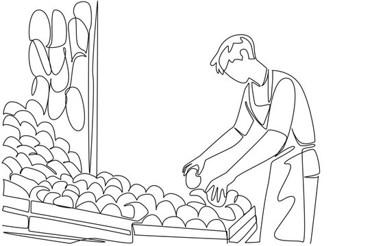 Single continuous line drawing man wearing apron is tidying up the fruit he is selling at his stall. Trader activities in the morning. National Small Business Day. One line design vector illustration