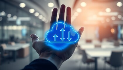 Hand presenting digital cloud symbol with up and down arrows in modern office setting cloud computing