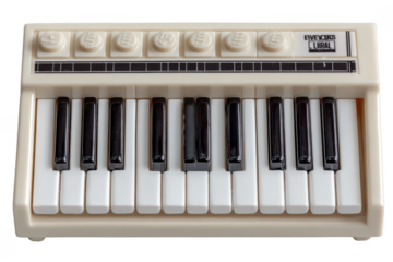 A compact white mini keyboard synthesizer with black and white keys, multiple control knobs, and buttons on top.