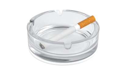 Clear glass ashtray with a single cigarette rests on a white background.