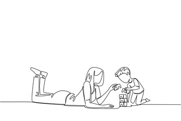 Single one line drawing a babysitter is lying on the floor accompanying a boy playing with building blocks. The creative nanny. National Babysitter Day. Continuous line design graphic illustration