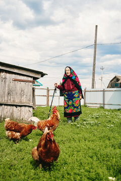 Senior woman, 80 years old, on a farm