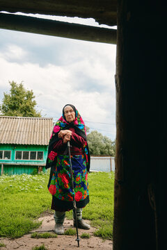 Senior woman, 80 years old, on a farm