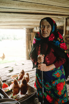 Senior woman, 80 years old, on a farm