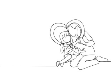 Single one line drawing girl and her mother sitting on the floor holding a heart shaped frame. Adorable photo shoot. Togetherness. Mothers at the Wall Day. Continuous line design graphic illustration