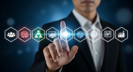 Businessman touching screen with icons for business management and strategy image photo