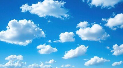 Obraz premium Clear Blue Sky with Fluffy White Clouds on a Bright Day