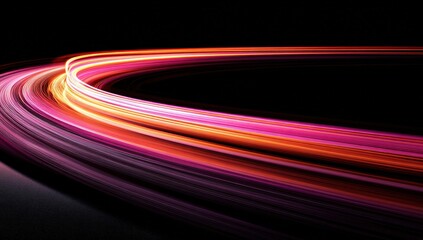 Abstract curved light trails on dark background