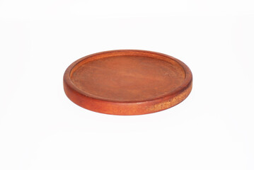 A dark brown wooden plate with a raised edge sits on a white background.