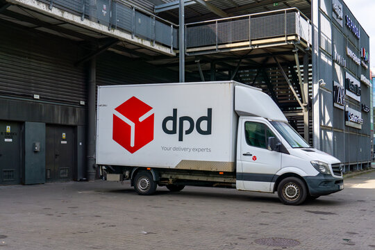White DPD delivery truck parked at Manufaktura shopping center. Courier services, logistics, parcel transport, distribution, Poland
