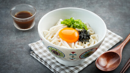 Udon Noodles with egg yolk and dashi soup, japanese food
