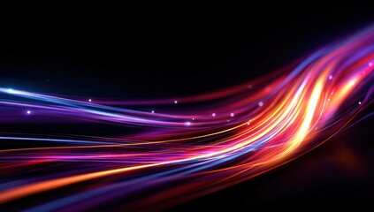 Abstract swirling light trails in vibrant colors against a dark background
