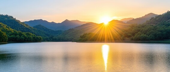 Sunrise over mountain lake landscape