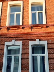 Part of an old building with walls made of red brick