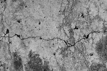 Texture of old cracked concrete wall. Rough gray concrete surface. Great for background and design. Close-up. High resolution.