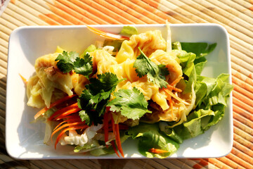 Gyoza or Shumai - Soy Sauce - Chinese food is fresh and ready to be served, it is popular in Asia and the warm morning sunshine makes it even more appetizing.