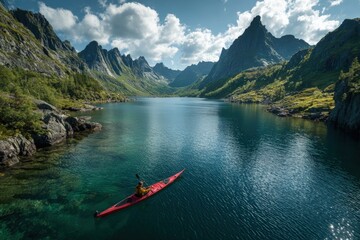 Kayaker on a tranquil mountain lake