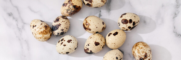 Speckled quail eggs scatter like galaxies on marble, symbolizing rebirth for Higan and whimsical...