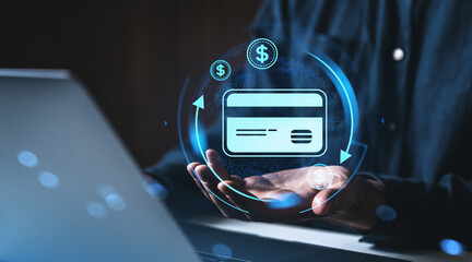 Fototapeta premium Digital concept of credit card payment and online spending over hands and laptop.