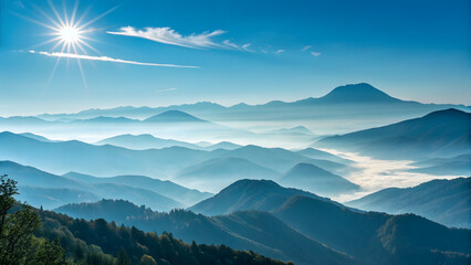 Fototapeta premium Misty mountain peaks bathed in golden sun light majestic landscape scenery