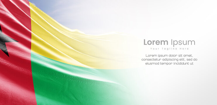 Guinea-Bissau national flag waving and fading on white background. The flag uses for banner and poster with text. Guinea-Bissau national flag for independence day. - Powered by Adobe