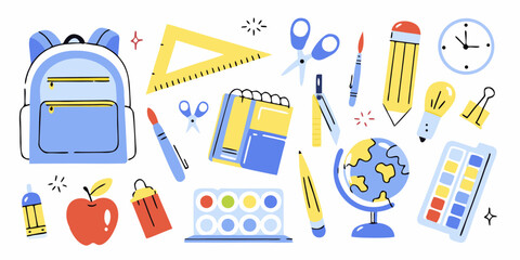 Collection of colorful school supplies and educational items arranged on a white background