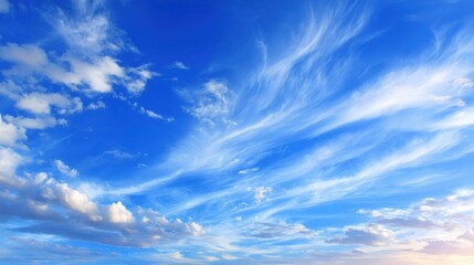 Obraz premium Blue Sky with Cirrus Clouds: Scenic Cloudscape for Backgrounds and Design Elements