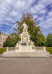 Iconic marble statue of Wolfgang Amadeus Mozart set amidst the picturesque Burggarten