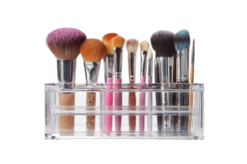 A clear container with a variety of makeup brushes inside. The brushes are of different colors and sizes, and they are arranged in a way that makes it easy to see and access them