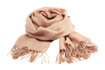 A scarf with fringes is laying on a white background. The scarf is tan in color and has a soft, cozy appearance