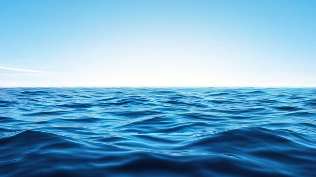 The image showcases a serene ocean view with gentle waves beneath a clear blue sky, ideal for travel blogs, relaxation themes, or environmental awareness campaigns,