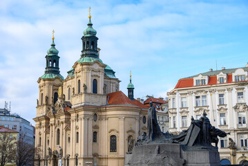 Jan Hus monument and Church of Saint Nicholas Czechoslovak Hussite Church in the Old Town square in Prague, Czech Republic