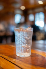 A glass of iced water on the table