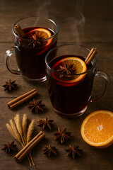 Cozy Mulled Wine with Citrus and Spices on Rustic Wood