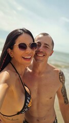 Fototapeta premium young couple happy on the beach