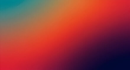 Obraz premium A soft, diagonal gradient background with color transitions from vibrant orange and red to dark blue and teal.