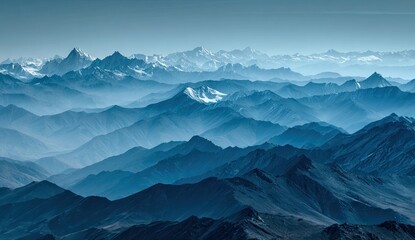 Majestic mountain range aerial view serene blue atmosphere.
