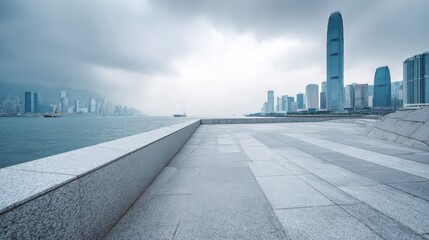 Fototapeta premium Urban Skyline View with Empty Terrace: Hong Kong Cityscape under Overcast Sky offering Modern Architectural Perspective