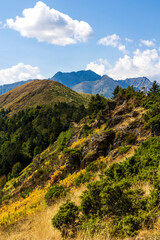 The Arbizon Massif seen from the Col d’Aspin, surrounded by verdant valleys and forested slopes...