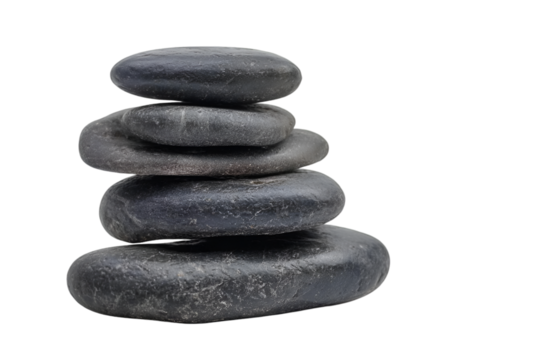 A serene stack of smooth black stones symbolizing balance and tranquility, perfect for wellness, meditation, or decor in a peaceful setting.