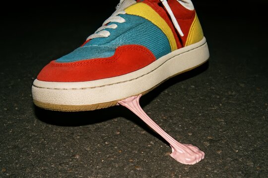 Colorful Sneaker Stuck on Chewing Gum