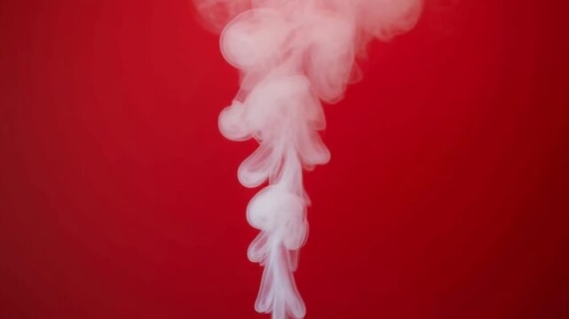 White smoke rises in vertical plumes against a background of crimson. Ideal for abstract designs, fire-related themes, and dramatic backgrounds.