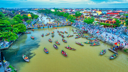 Aerial view of Hoi An ancient town, Vietnam at dusk or night, this place is a UNESCO world heritage site. Hoi An is one of the most popular destinations in Vietnam © huythoai
